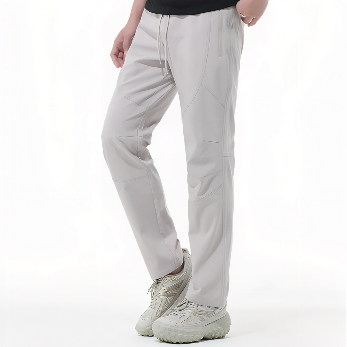 Pantalon Léger Randonnée Homme portée sur un modèle - Gris Clair - Noir Profond - Gris Foncé